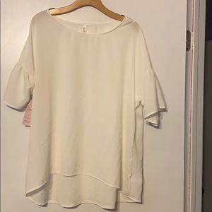 Ivory ruffle sleeve blouse. NWT. Dress Up Boutique